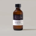 Advanced Rejuvenating Concepts  Professional Rebright HQ  Amber glass bottle with a black cap on a beige background